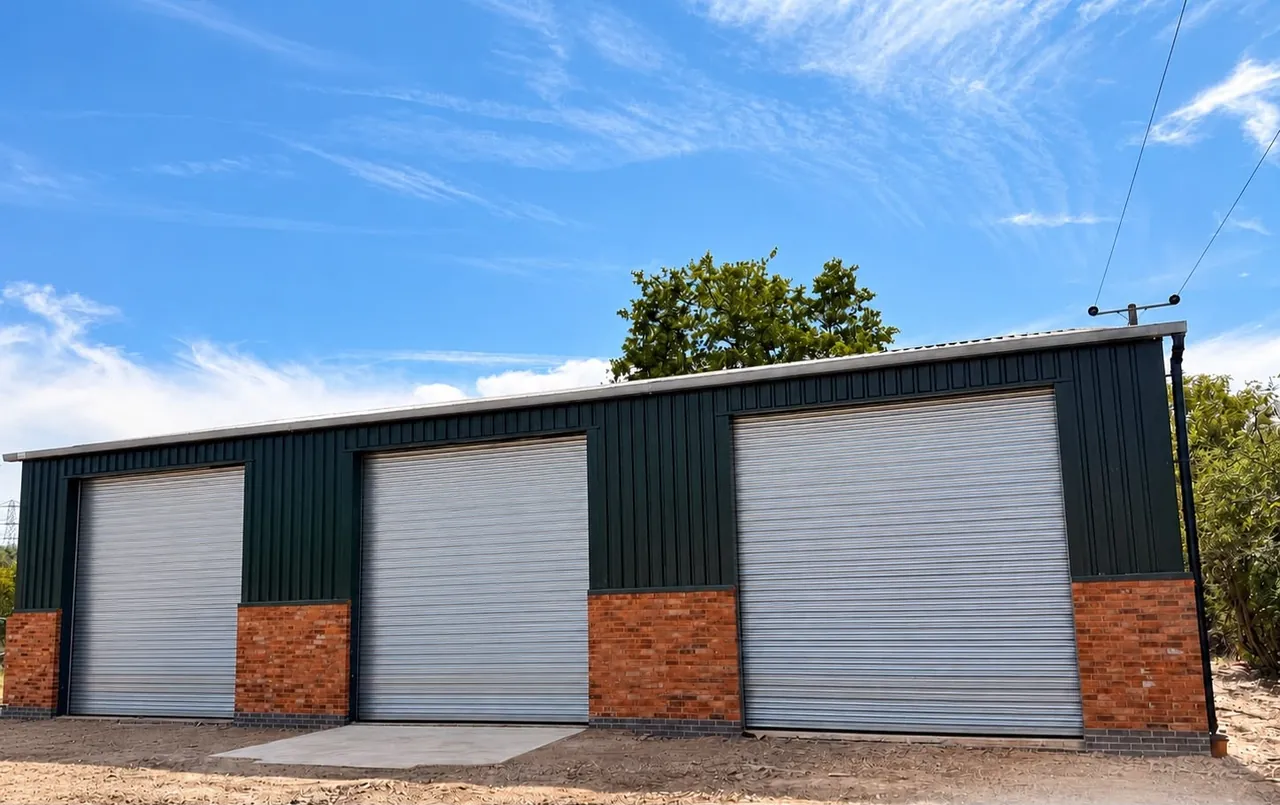 Completed steel-frame building with roller shutter doors