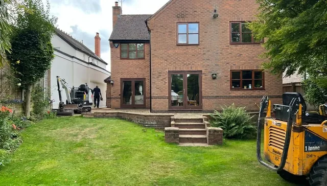 Groundworks starting for a rear extension with mini digger