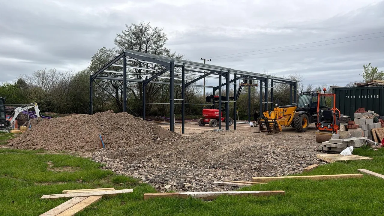 Steel-frame building structure on a prepared base