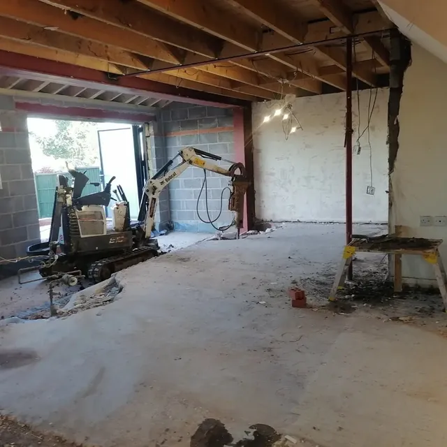 Open-plan space after load-bearing wall removal with steel installation