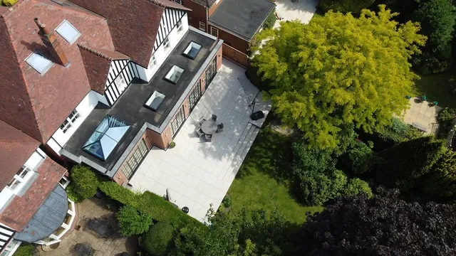 Aerial view of a single-storey extension with roof lanterns built by Swift Build