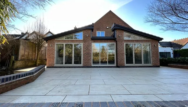 Completed single-storey rear extension with bi-fold doors and new porcelain patio in Coventry